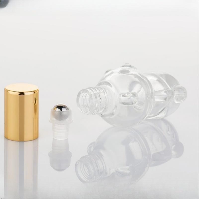 エッセンシャルオイルガラスボトル空のクリアクマ型スチールロー - Perfume Fragrance Liquid のレビューと価格